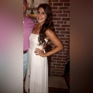 Beautiful off-white strapless high low dress with embroidering